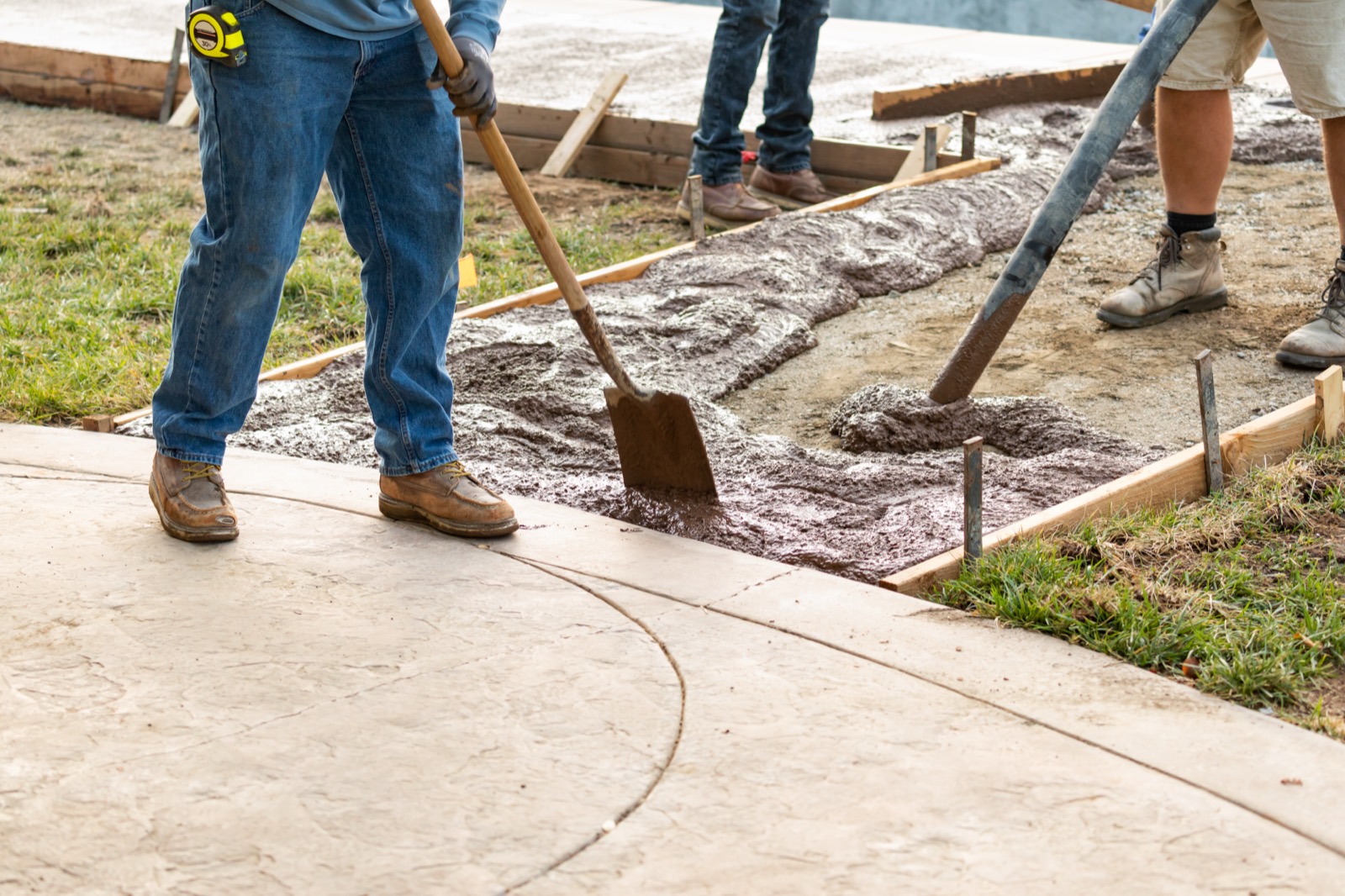 ZM Concrete crew finishing a stamped concrete pour
