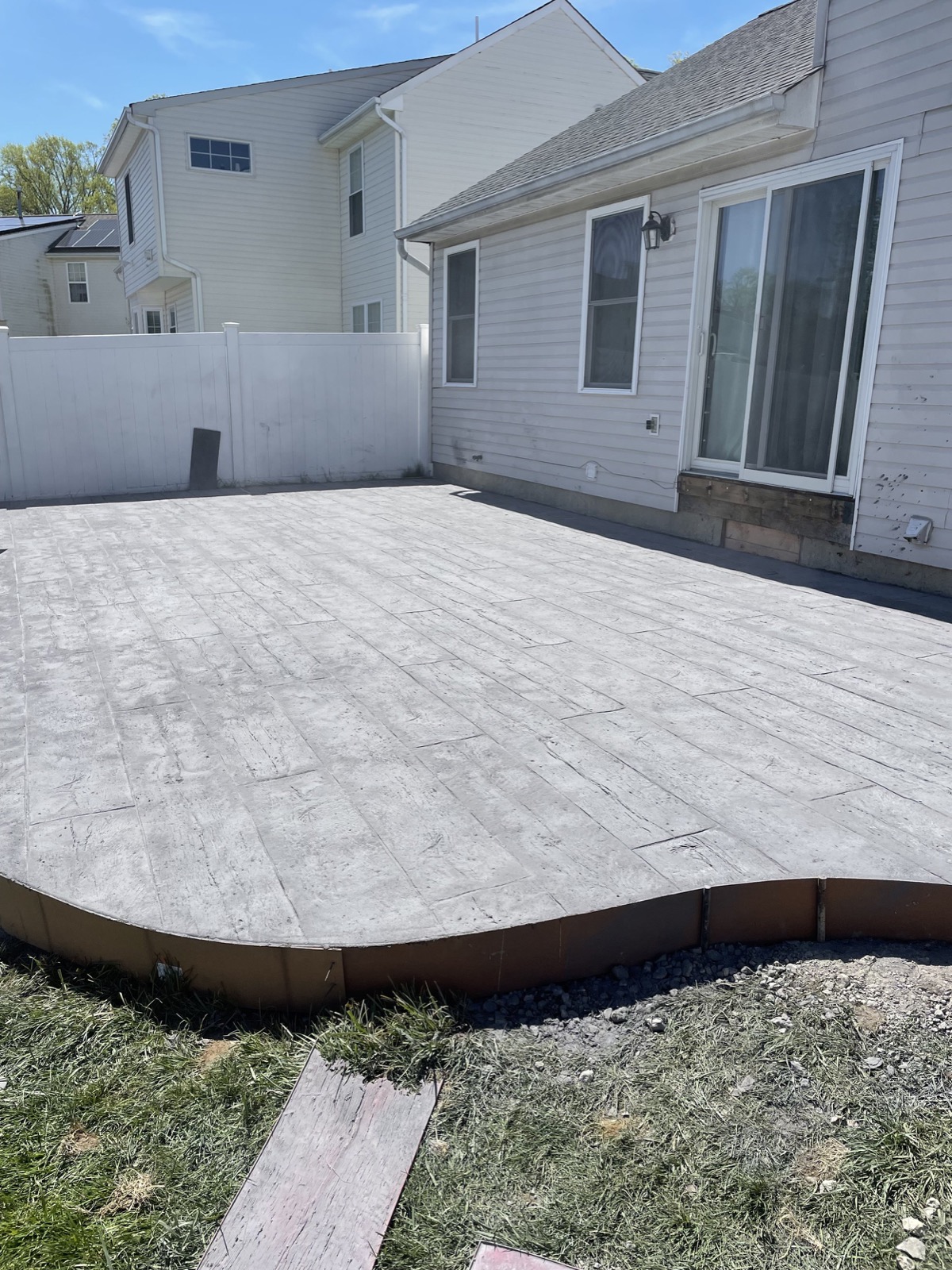 Wood-plank pattern stamped concrete patio